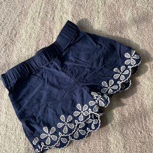 Girls Navy shorts with white embroidered flowers